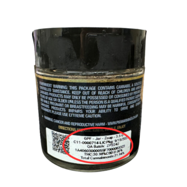 Photo of the back label showing the UID and batch numbers